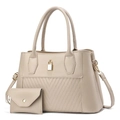 Detail of beige quilted tote bag with golden lock and matching envelope pouch - Light Khaki