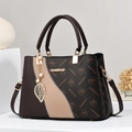 Chic tri-color patchwork tote bag with gold metal logo and leaf pearl pendant on base - Coffee