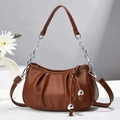 Close-up of brown pleated handbag featuring silver chain handle and drawstring bead detail - L21 W24 H8 / Earthy Yellow