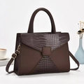 Structured dark brown stone pattern handbag with golden hardware on a white background - Coffee