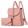 Pink lychee leather backpack and envelope clutch set with gold metal buckles on white background - Pink