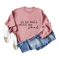 Flat lay of pink sweatshirt with It is well with my soul text and cotton fabric detail - S / Rose Gold (Black Font)