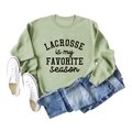 Flat lay of sage green Lacrosse sweatshirt with blue jeans and white canvas shoes - S / Olive Green Sweatshirt (Black Font)
