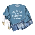 Flat lay of light blue crewneck sweatshirt with white Lacrosse is My Favorite Season print - S / Blue Sweatshirt (White Font)