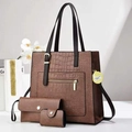 Detail view of brown crocodile texture tote bag with matching pouch and card holder set - Khaki