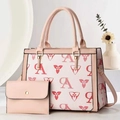 Pink and beige patterned tote bag set with matching clutch and golden hardware accents - Pink