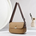 Detail of tan pebble leather crossbody bag with vintage geometric pattern wide strap - Khaki