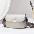 Silver pebbled leather saddle bag with wide ethnic style woven adjustable shoulder strap - Silver