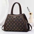 Elegante borsa a mano vintage marrone con stampa monogramma e dettagli dorati - caffè