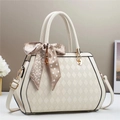 Chic white quilted tote bag with gold metal handles and stylish patterned scarf detail - Off White