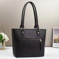 Fashionable black macaron bucket bag with lychee pattern leather and gold hardware - Black