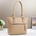 Beige bucket tote bag in pebbled leather with long handles and front zip detail - Apricot