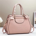 Pink crocodile embossed tote bag with scarf-wrapped handle and golden hardware details - Pink