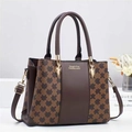 Vintage brown leather tote bag with star floral pattern and adjustable shoulder strap - Mosaic Coffee & Coffee