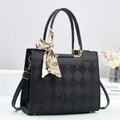 Quilted black bucket bag with gold hardware and elegant scarf-wrapped handle - Black