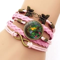 Bracciale multistrato in pelle rosa con farfalla di bronzo e gemma di vetro foresta - Rosa