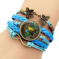 Bracciale bohémien multistrato in pelle con trecce blu, simbolo infinito e ciondoli a farfalla - Blu
