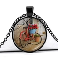 Detail of vintage bicycle pendant with red roses under a round glass cabochon - Red Bike Stone Wall Background Style (JY007494-11)