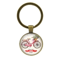 Detail of vintage bronze keychain featuring a watercolor bicycle under glass cabochon - Jy007497-15