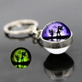 Portachiavi fata luminoso con ali di farfalla e sfera di vetro con effetto fosforescente - Stile Fata Sotto la Luna (JY007398-3)