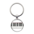 Macro detail of silver musical keychain with heart piano keys pattern inside glass - Simple Piano Keys Style (JY007514-12)