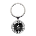 Macro detail of silver musical keychain with treble clef and piano keys graphic charm - Treble Clef Piano Keys Style (JY007514-7)