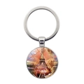 Macro view of Eiffel Tower art glass dome keychain with polished silver metal ring - Fantasy Art Style Pendant (JY007578-14)