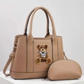 Detailed view of khaki teddy bear embroidery tote and matching semicircular zipper pouch set - Khaki