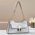 Detail of white crocodile embossed handbag with golden chain strap and two-tone metal lock - Gray