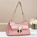 Pale pink faux crocodile leather handbag with elegant gold chain and metal lock closure - Pink