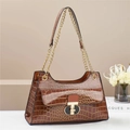 Brown crocodile pattern handbag with gold chain strap and elegant metallic buckle - Brown