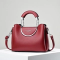 Deep red lychee grain handbag with elegant silver metal handles and adjustable strap - Wine Red
