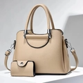 Detail of beige litchi leather handbag set with matching coin purse and detachable strap - Khaki