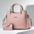 Pink lychee texture tote bag and matching coin purse set on a minimalist pedestal - Pink