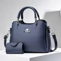 Navy blue lychee leather tote bag set with matching small wallet and silver accents - Blue