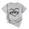 Detail of grey Pilates heart print T-shirt showing modern knotted hem design - Light Gray (Black Font)