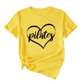 Detail of lemon yellow cotton Pilates t-shirt featuring heart print and stylish knotted hem - Yellow (Black Font)