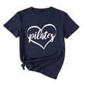 Close-up of navy blue Pilates t-shirt featuring heart print and stylish side knot detail - Navy Blue (White Font)