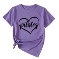 Detail of purple Pilates heart T-shirt featuring a stylish front knot and soft cotton fabric - Purple (Black Text)