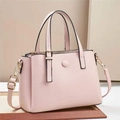 Minimalist light pink crossbody handbag with lychee pattern and gold hardware details - L25 W12 H18 / Pink