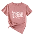 Détail de l'imprimé hospice nurse et du nœud latéral sur le t-shirt en coton rose - S / Or Rose (Police Blanche)