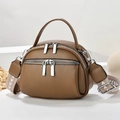 Brown litchi grain multi-layer round shoulder bag with woven strap on minimalist platform - Khaki