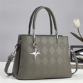 Chic grey quilted tote bag with star charm and detachable shoulder strap in vegan leather - Gray