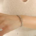 Silver chunky link bracelet in stainless steel with spherical detail on a model wrist - 16+5cm / Steel Color Bracelet (E221)