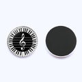 Detail of music themed fridge magnets with piano keys and musical notes design - Music Art Circle Style (JY007525-7)