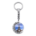 Detail of European Eiffel Tower keychain with rotating glass pendant and silver crescent frame - Blue Scenery Pendant (JY007580-19)