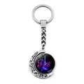 Close-up of rotating silver moon keychain featuring Eiffel Tower glass cabochon - Paris Lover Starry Sky (JY007580-18)