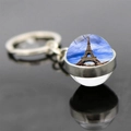 Detailed macro view of Eiffel Tower pendant with double-sided glass ball on silver keychain - Real Shot Panorama Style (JY007582-19)