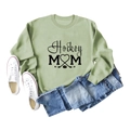 Sage green Hockey Mom sweatshirt paired with jeans and white sneakers on white background - S / Olive Green Sweatshirt (Black Font)