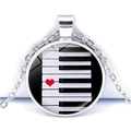 Detail of silver piano key heart pendant featuring black and white keys on white background - Red Heart Artistic Piano Keys Style (JY007513-9)